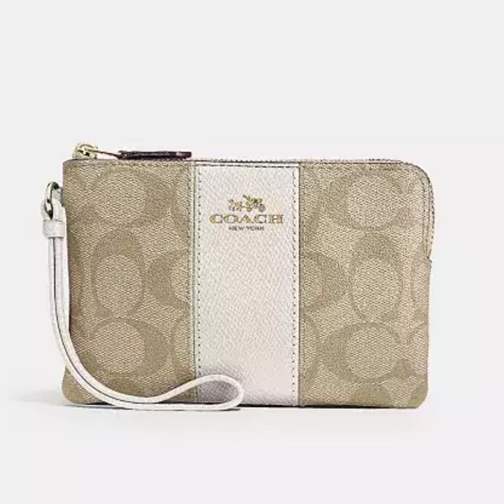 Coach CORNER ZIP WRISTLET IN SIGNATURE CANVAS new in packaging